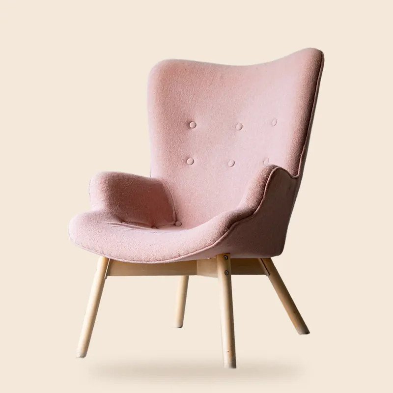 Blush wingback chair