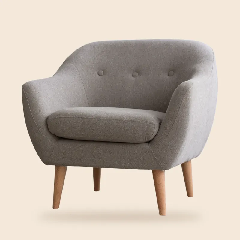 Grey button-back armchair