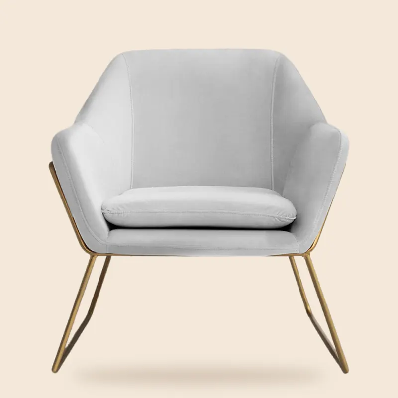White accent chair with brass legs