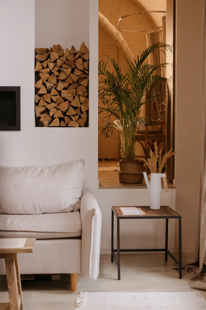 Cosy reading corner with a cream armchair and side table