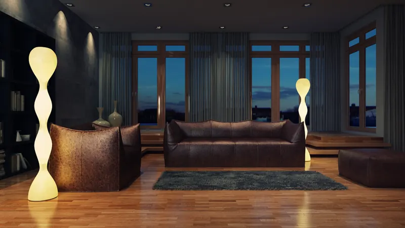 Lounge with a leather sofa, bean chairs and sculptural floor lamps