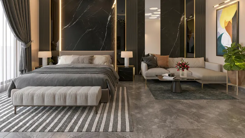 Bedroom with a marble feature wall and upholstered bench