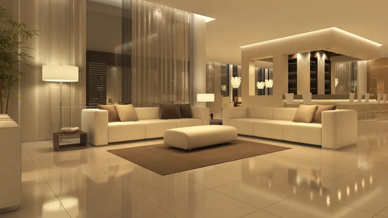 Warm-lit living room with cove ceiling lighting
