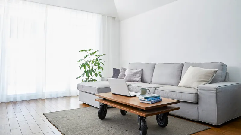 Living room with floor-length sheer curtains